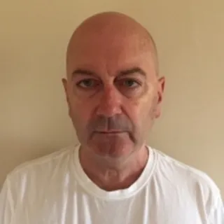 Мик Уолл